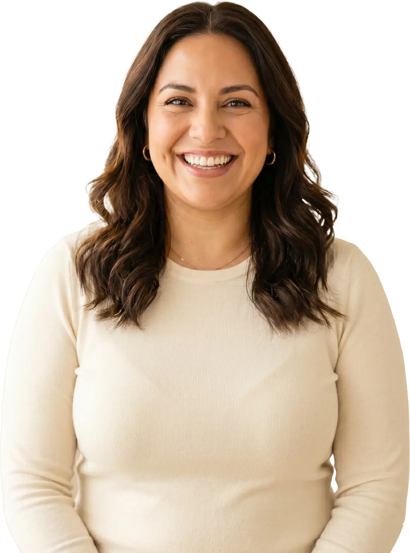 A smiling woman with wavy dark hair in a cream top