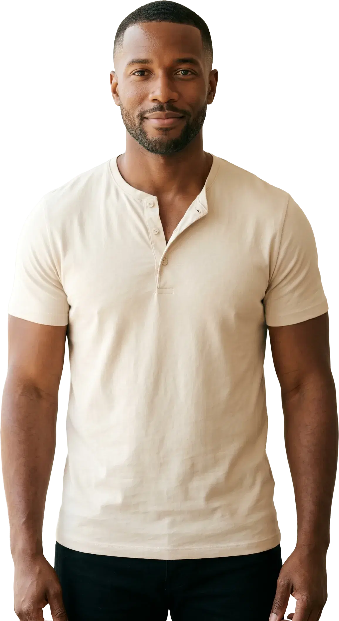 A smiling man with a short beard in a beige henley shirt