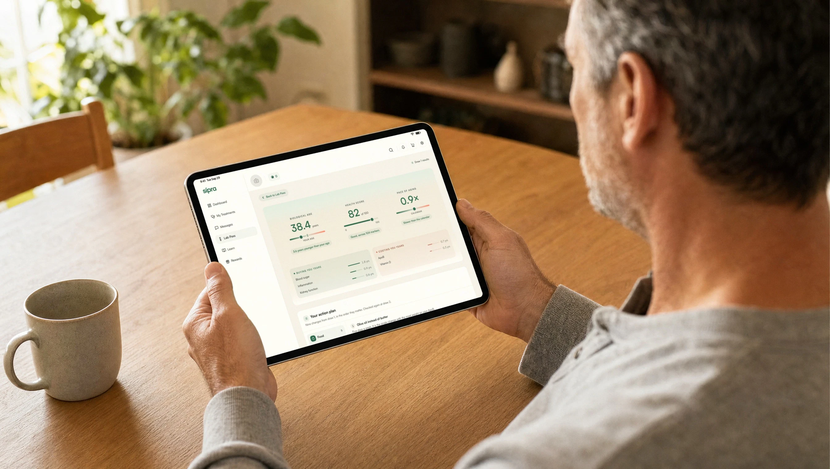 A member reading his results on a tablet